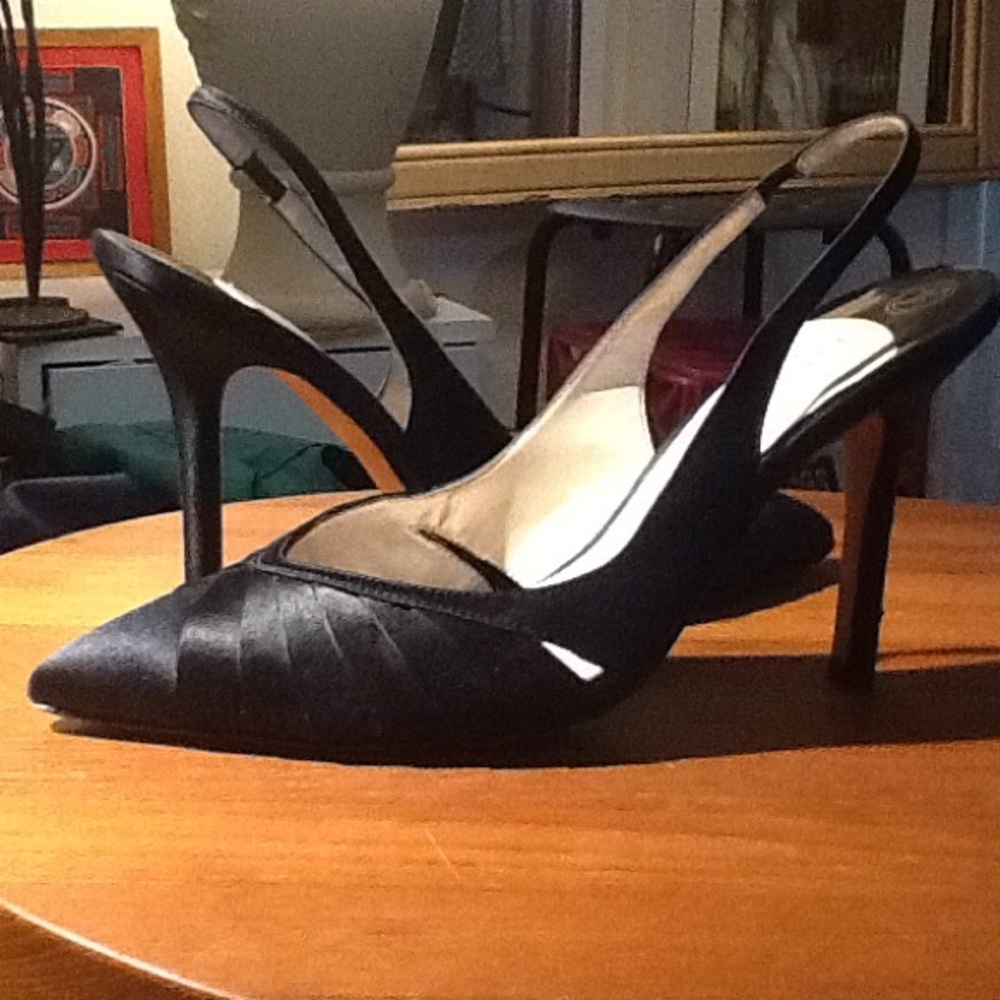 Modern, gorgeous black satin heels.